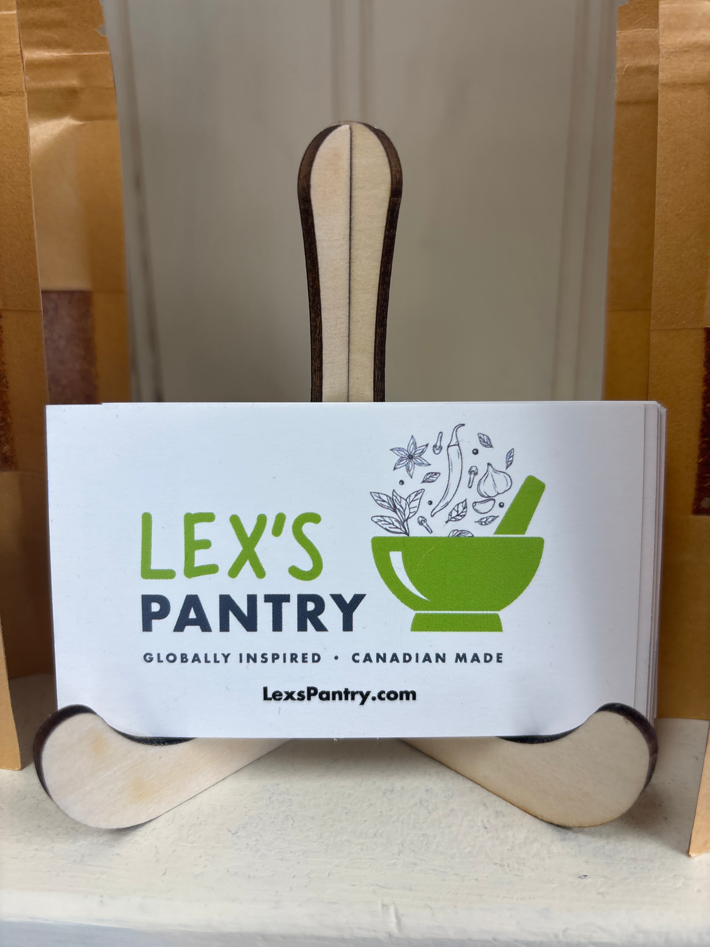 Pouch with 'Lex's Pantry' branding on a white background