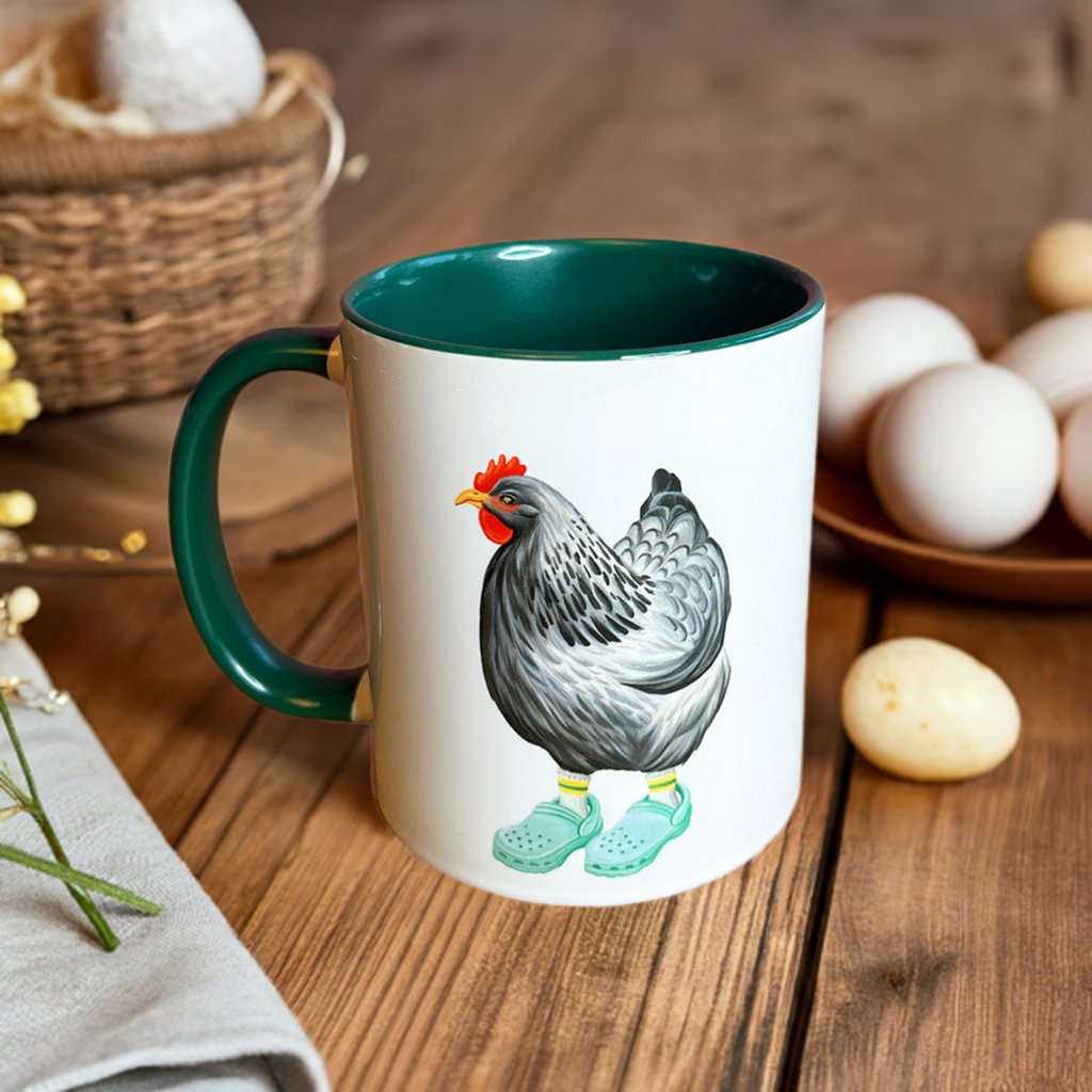 Mug with a chicken design on a wooden table with eggs in the background