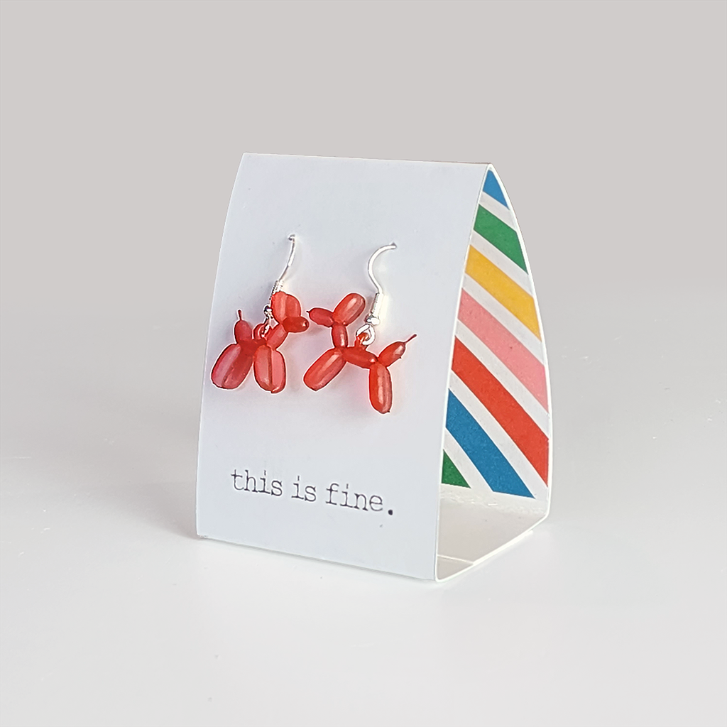 balloon art earring red on a display card