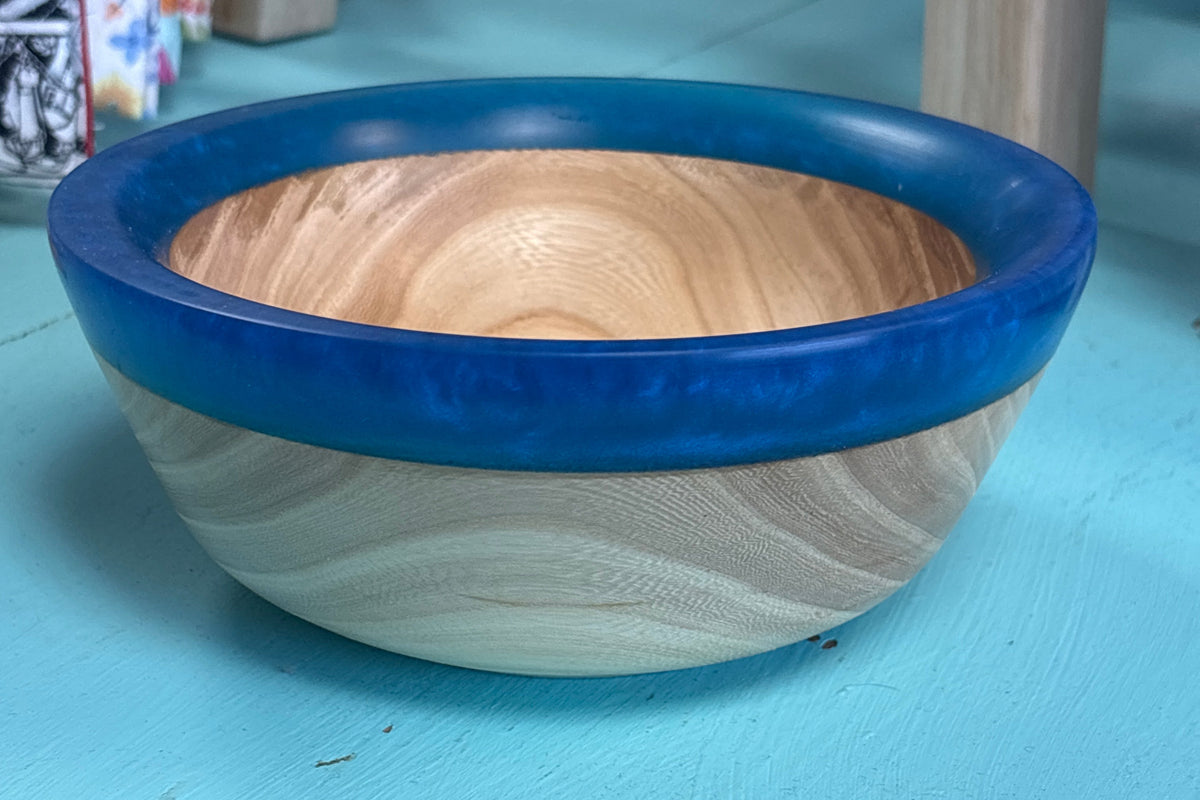 light wood bowl with blue resin

