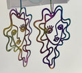 Colorful abstract designs on a white background with a visible price tag.