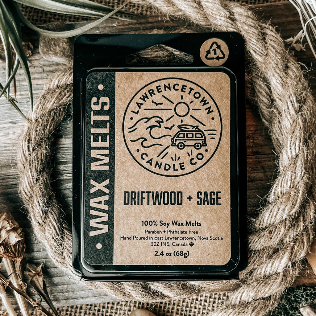 Lawrence Town Candle Co. wax melt packaging on a rustic background with twine and dried plants.