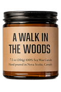 Candle jar labeled 'A Walk in the Woods' on a white background