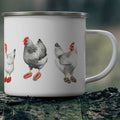 White enamel mug with chickens waring slippers